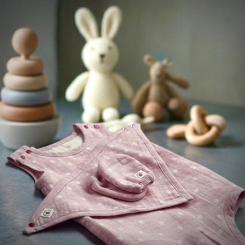Pokka Kids pink GOTS organic cotton luxury newborn baby shower gift of organic onesie, bandana bib, stay-on mittens for eczema prone skin