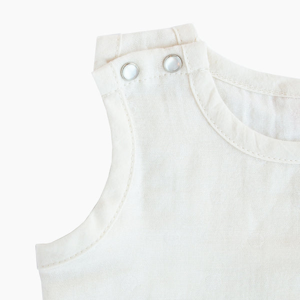 Sleeveless easy to wear dye free GOTS Certified organic cotton baby bodysuit designed for eczema