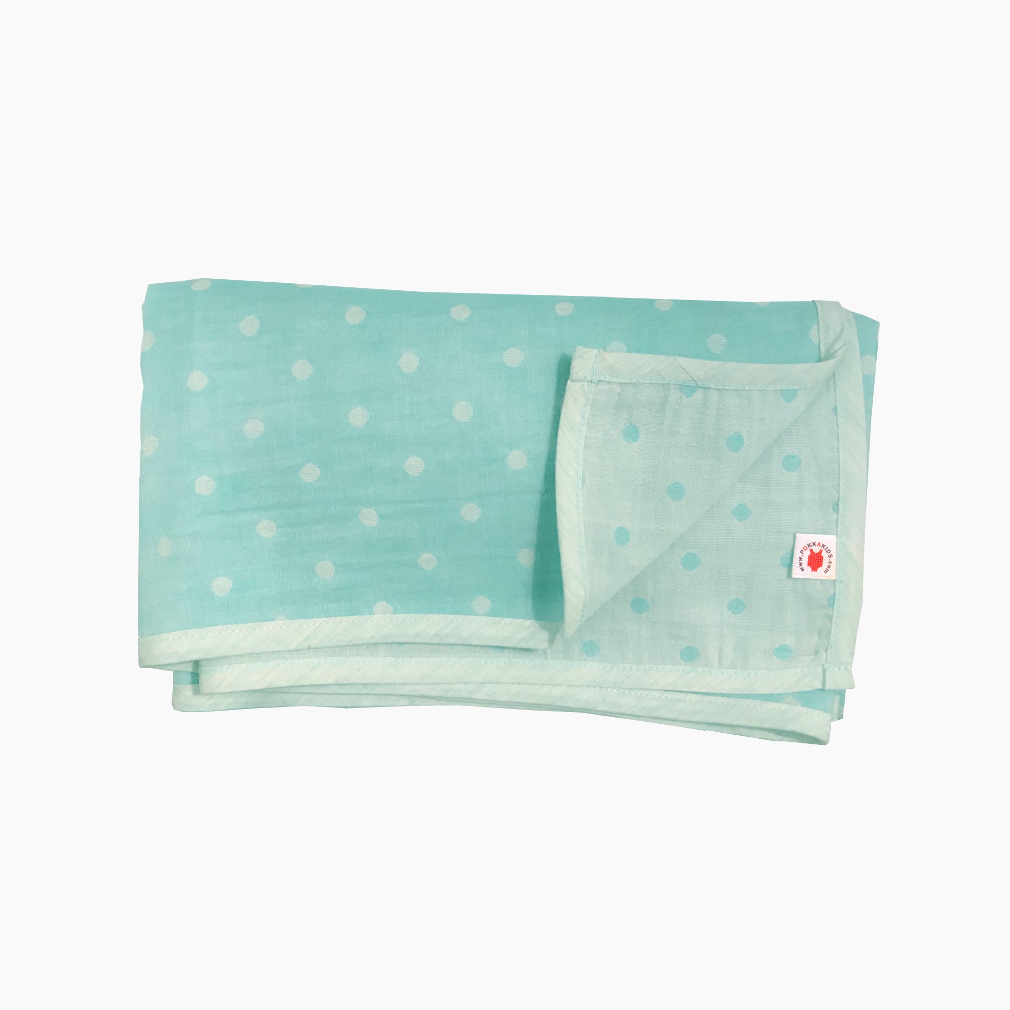 Folded mint polka dot GOTS certified organic cotton blanket for use as a stroller cover, or nursing cover