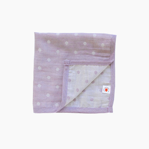 Folded purple GOTS certified organic cotton hanky for use as a wash cloth, burp cloth, bib, scarf or security blanket